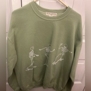 Green skateboarding skeleton sweatshirt